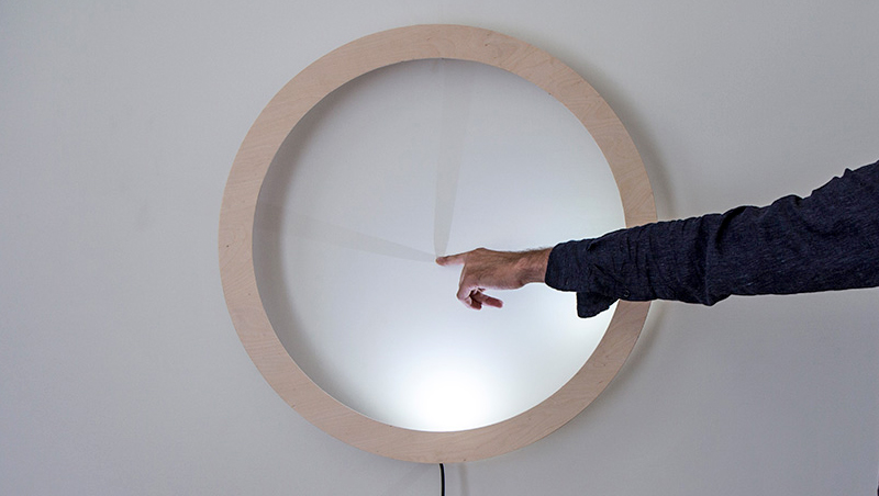 Illustration for article titled Pointing at This Glowing Clock Isn't Rude, It's the Only Way to Display the Time